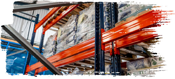 High-level warehouse racking with stacked pallets of insulation and render products, stored on orange beams and metal frames from EWI store